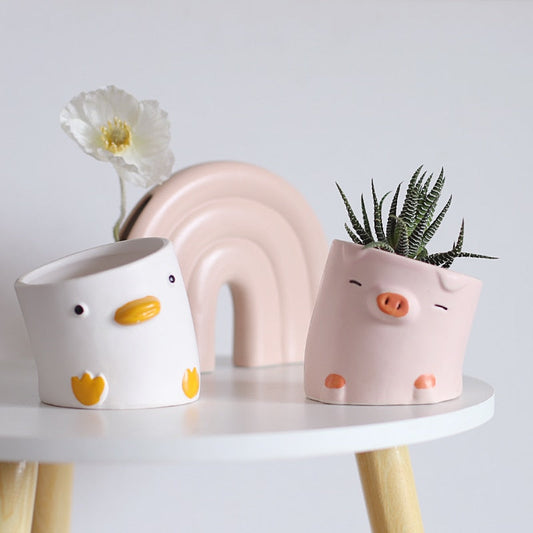 Crooked Duck and Pig Planters